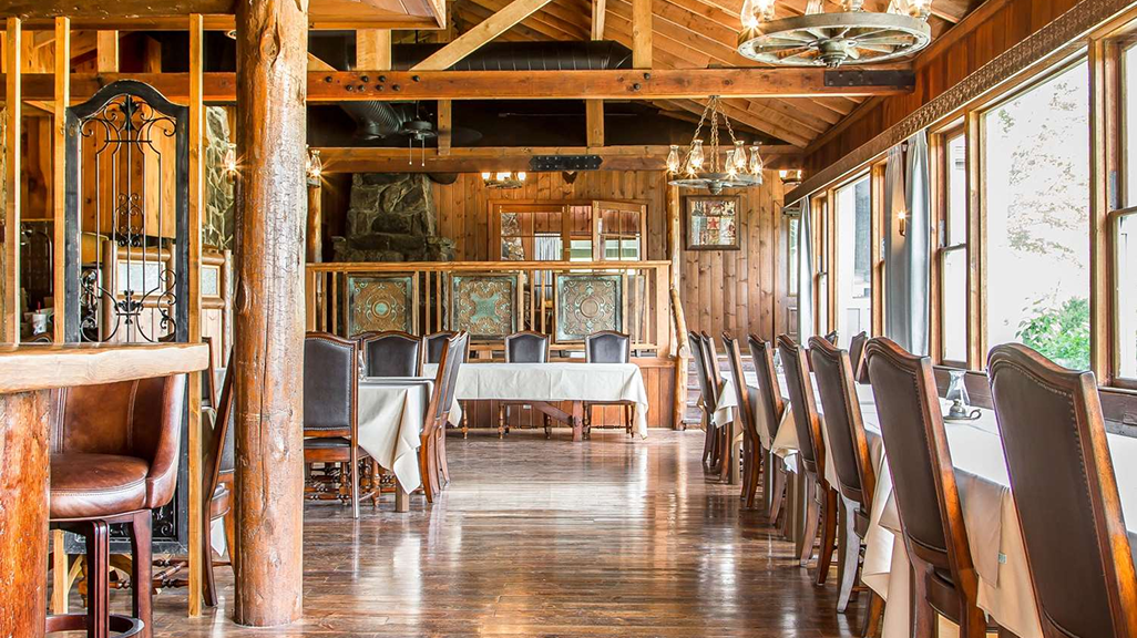 Rustic and romantic Dining Room set for wedding reception at Sierra Sky Ranch historic venue near Yosemite National Park Oakhurst CA