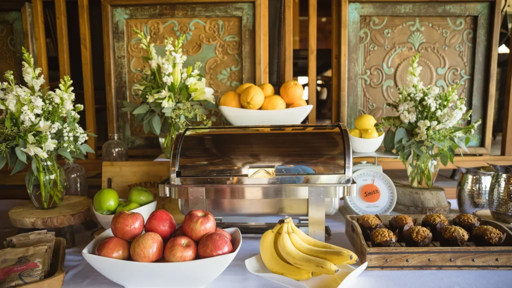 Complimentary continental breakfast service in rustic dining room at Sierra Sky Ranch boutique hotel near Yosemite South Entrance