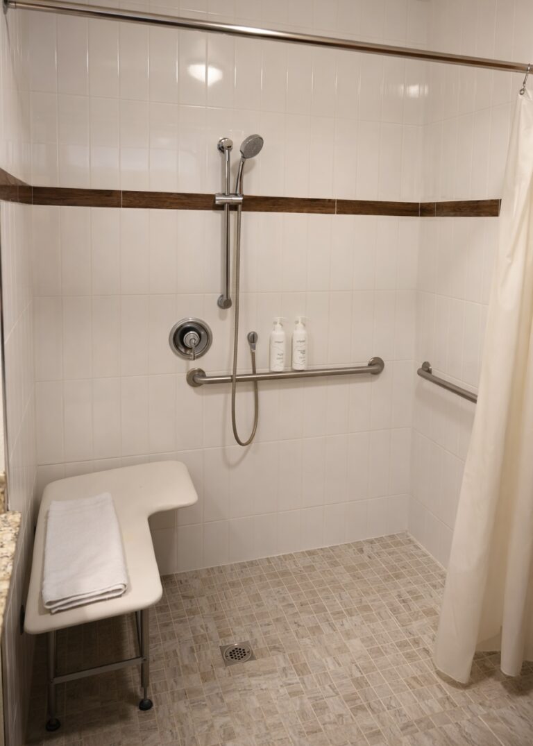 ADA accessible bathroom with roll-in shower in Guest House king room at Sierra Sky Ranch boutique hotel near Yosemite National Park