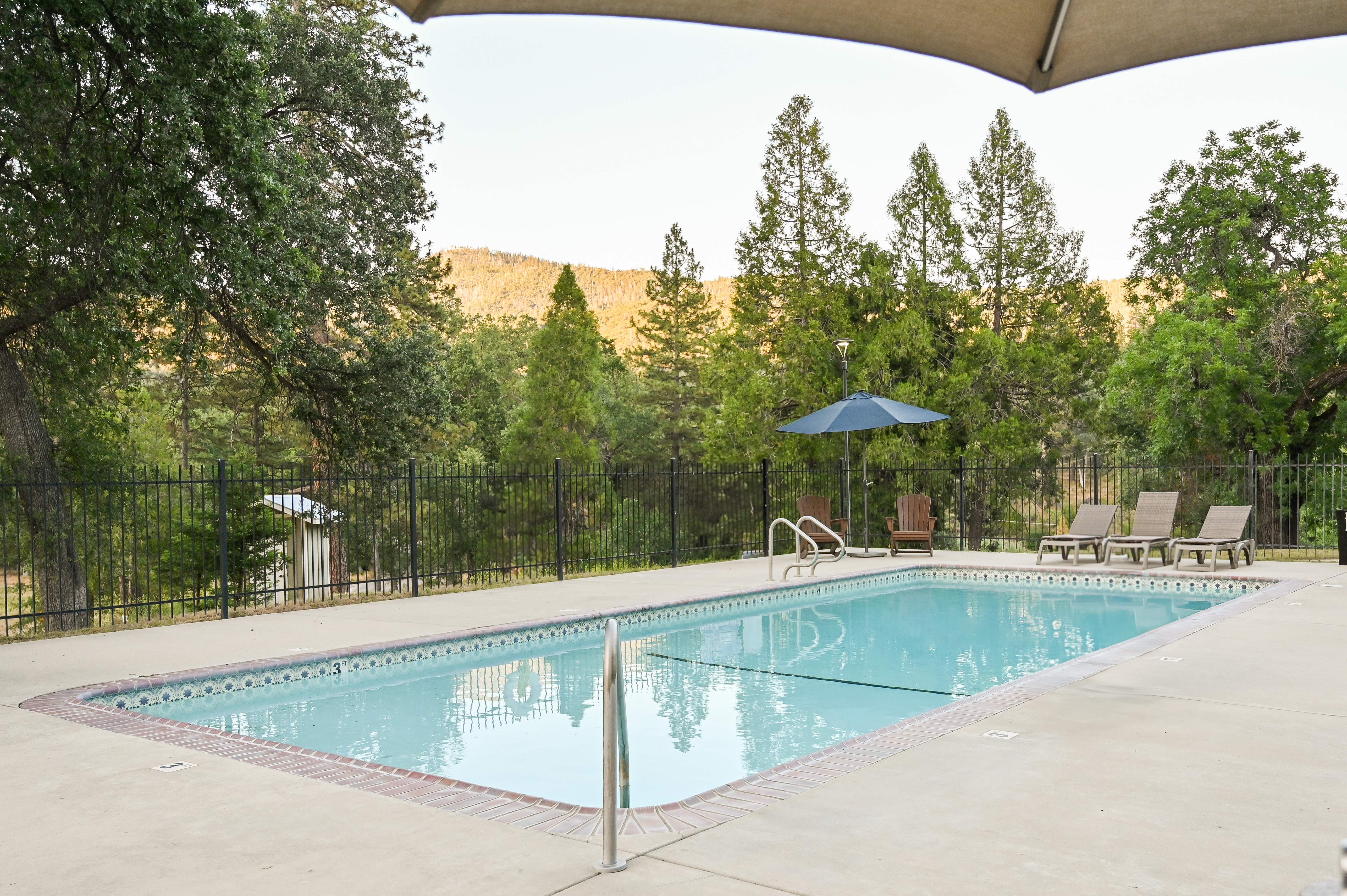 The seasonal outdoor pool at Sierra Sky Ranch, open late spring through early fall.