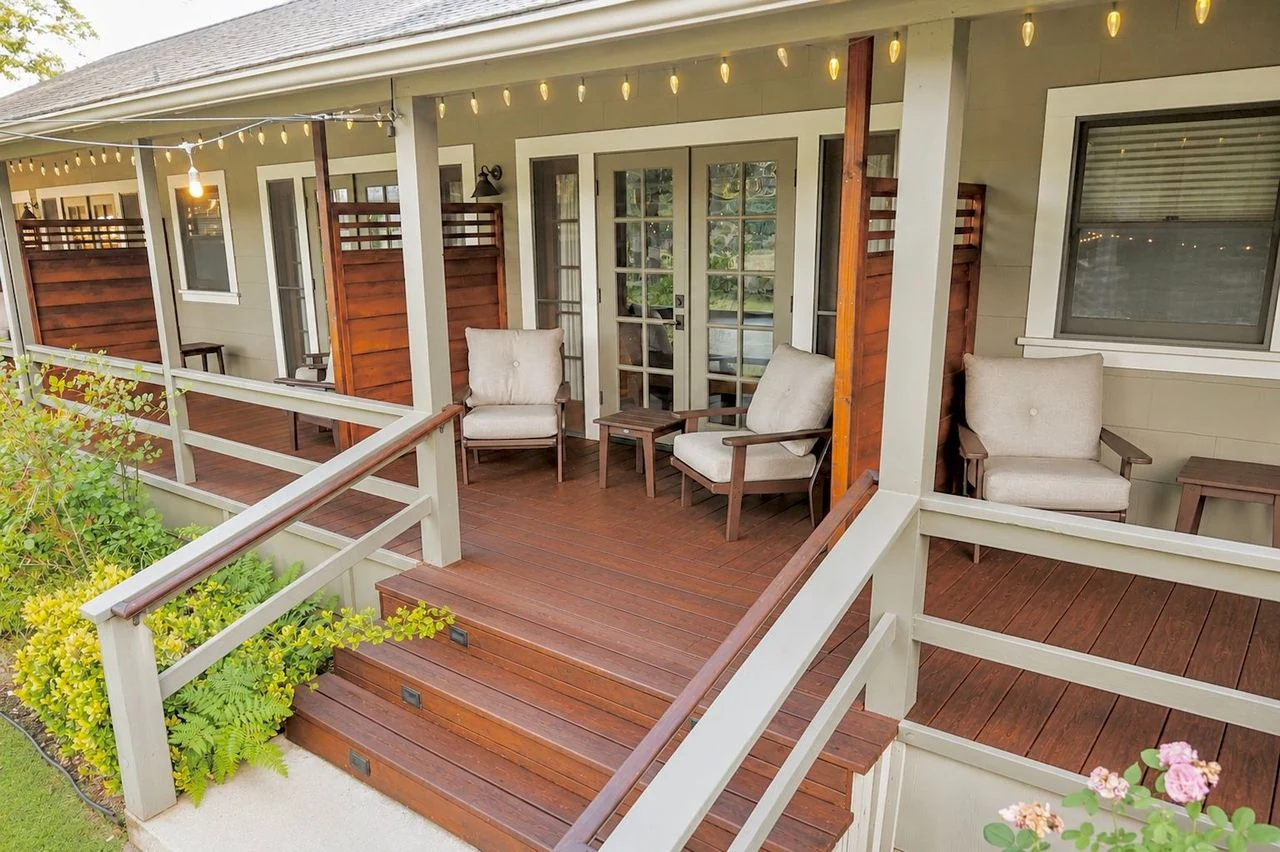 Sierra Sky Ranch wraparound veranda bathed in warm evening light.